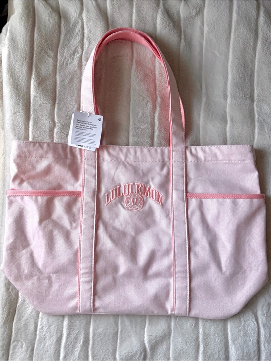 lululemon athletica Handbags - RARE Lululemon Daily Multi Pocket Canvas Tote 20L Collegiate Pink Pearl NWT